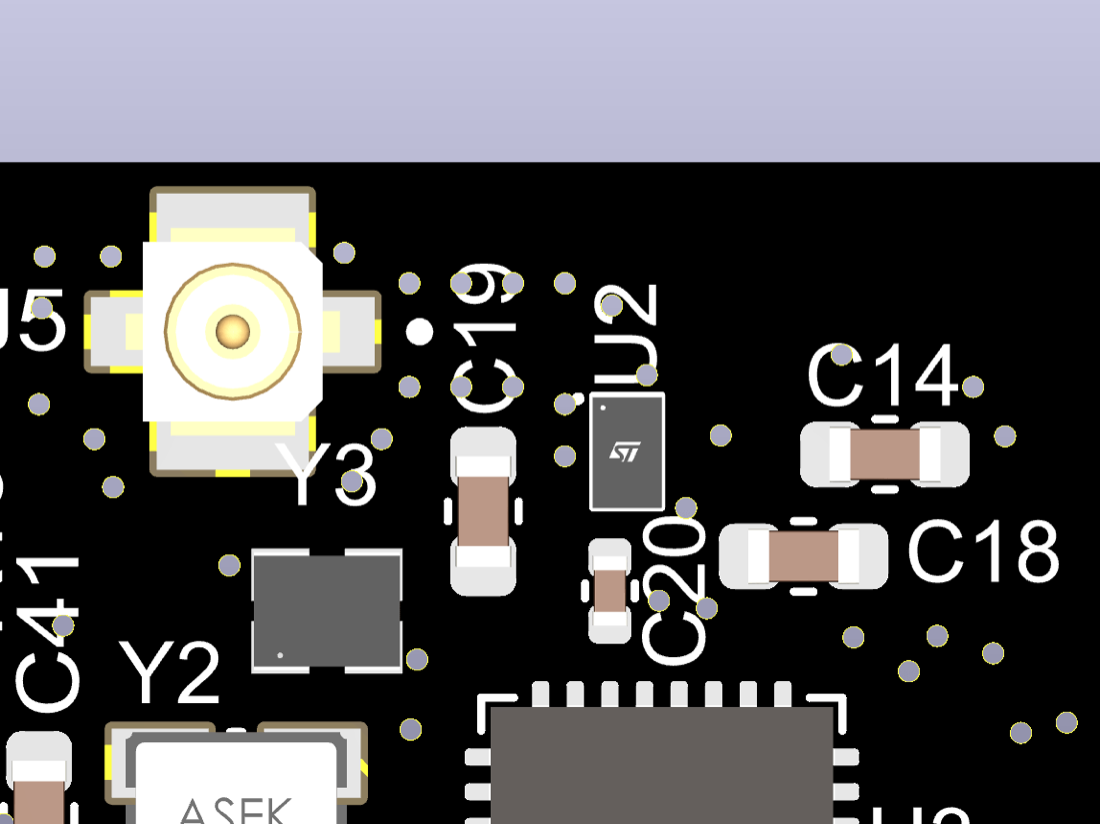 Close-up of the U.FL connector and crystal on the ECG board